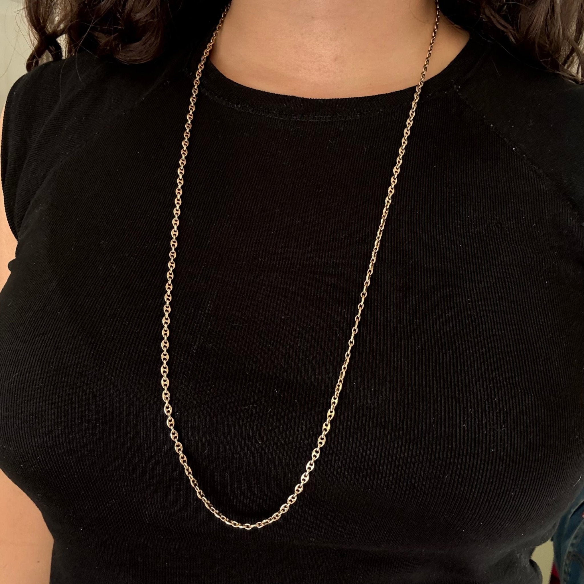 Long vintage 14kt yellow gold mariner link chain styled on model
Vintage fine jewelry mariner chain, 30-inch 14k gold necklace