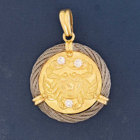 Vintage Fred Paris Cancer zodiac pendant in 18K yellow gold with diamond accents and rope-style white gold border.