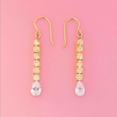 Pair of vintage dangle earrings featuring old mine-cut diamonds and pear-shaped drops set in yellow gold