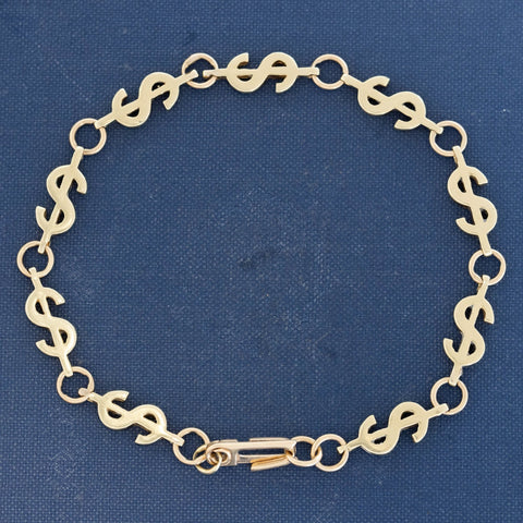 Vintage dollar sign link chain bracelet in 14kt yellow gold