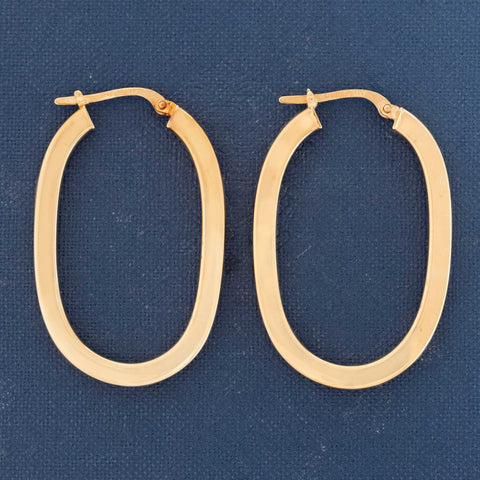 Vintage Italian elongated oval hoop earrings in 14kt yellow gold