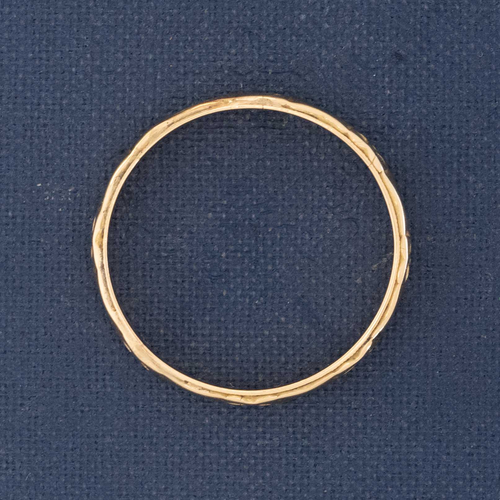 Side profile of vintage heirloom-quality 14kt gold wedding band with history.