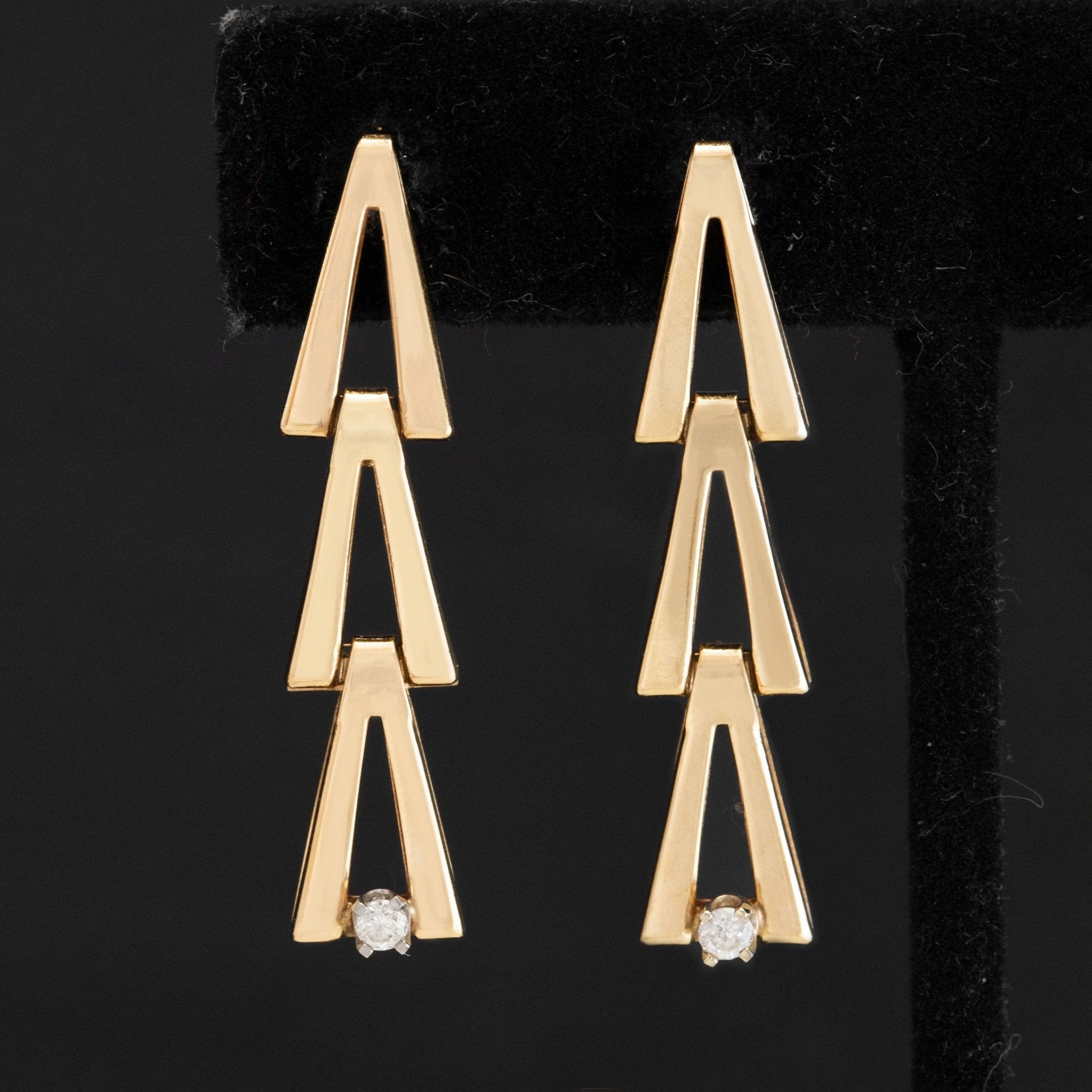 Front view of 14kt yellow gold V-link drop earrings with petite diamond accents.