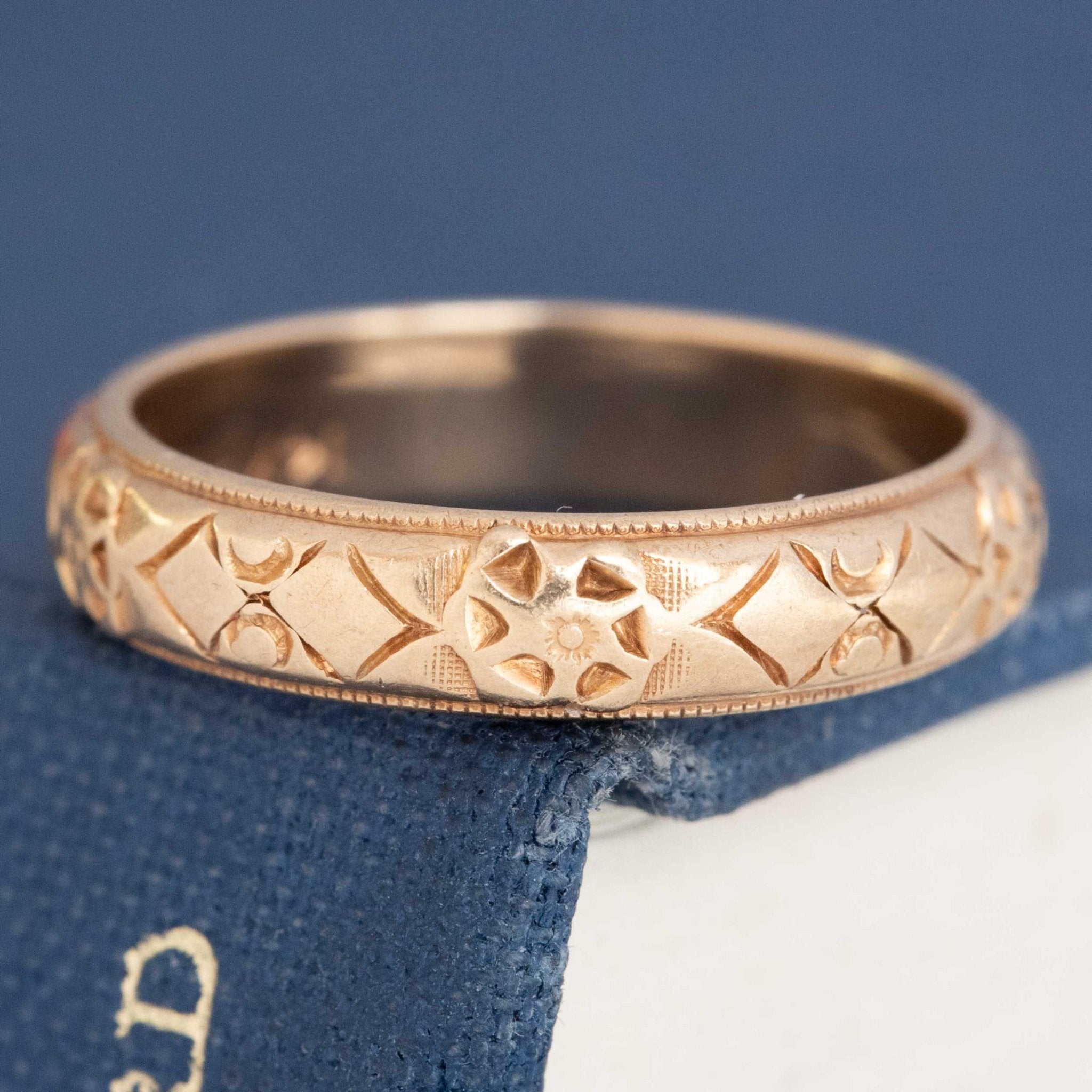 Authentic antique 14kt gold wedding band with heirloom quality and beautiful engraved details