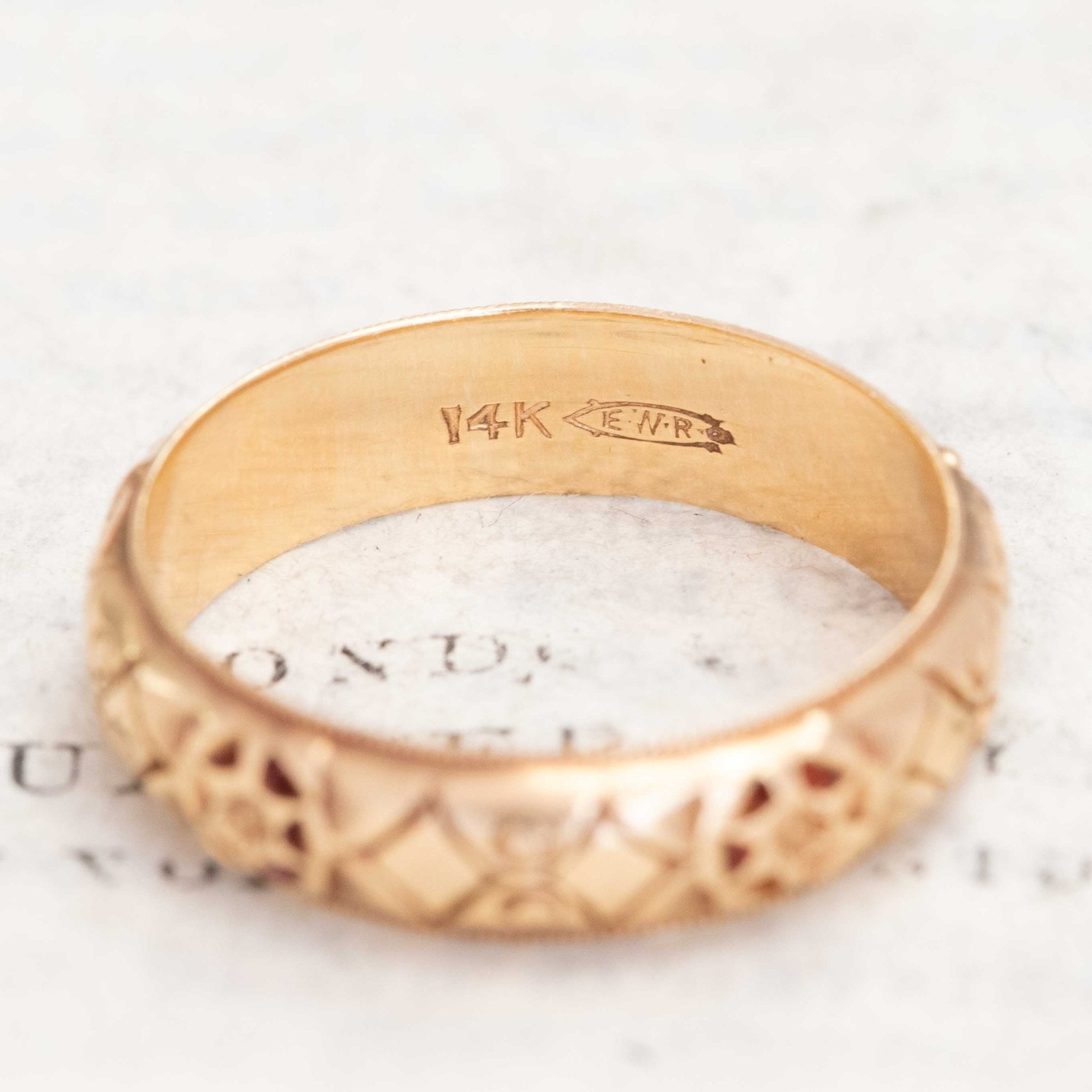 Antique 14kt gold wedding band with subtle handcrafted details.