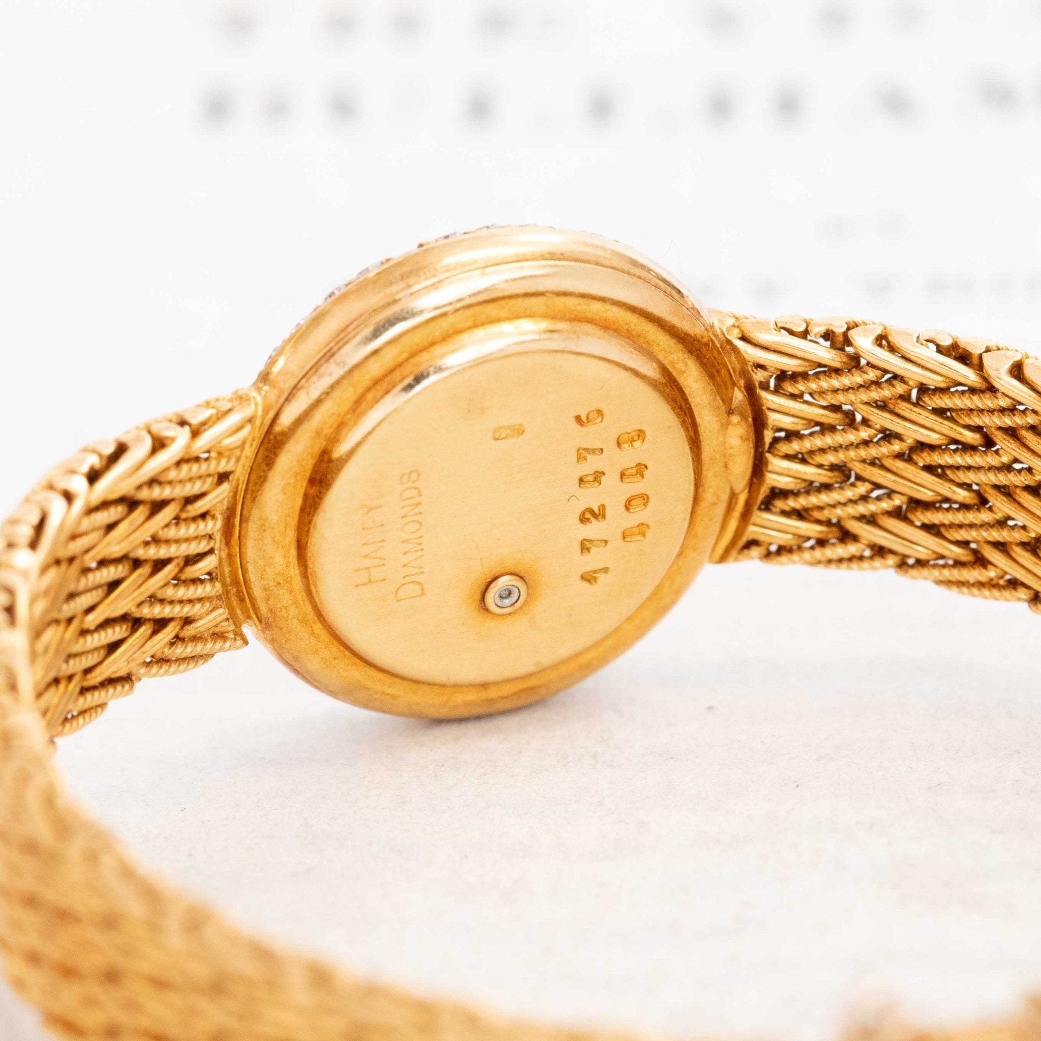 Close-up of floating diamonds inside vintage Chopard watch dial