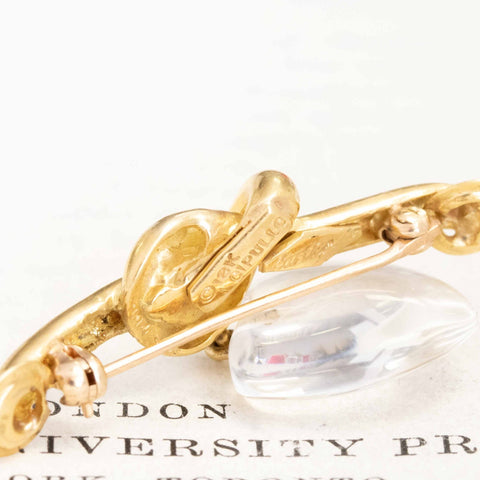 Vintage Aldo Cipullo for Cartier lover's knot brooch with carved rock crystal heart in 18kt gold – alternate view 4