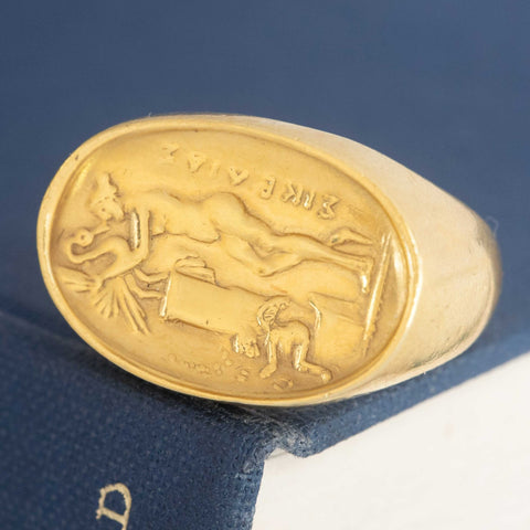 A vintage high karat signet ring by designer Zolotas depicting "Leda and the swan." One of a kind and a rare jewel.