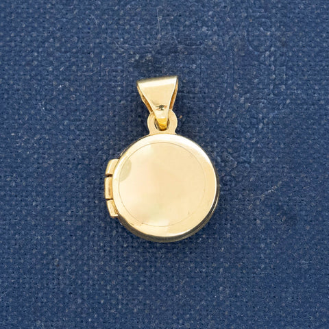 Vintage mini round locket charm in 14kt yellow gold