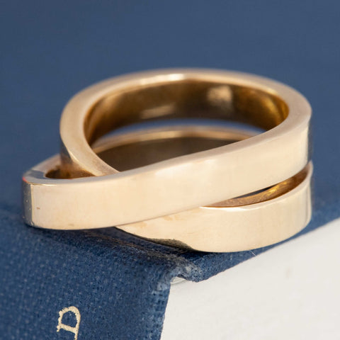 Vintage Cartier Nouvelle crossover band in 18k yellow gold, bold and sculptural design.