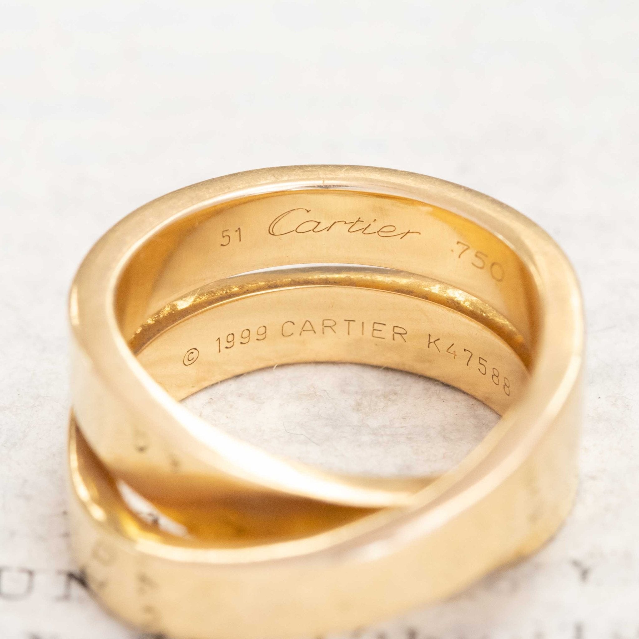 Cartier Nouvelle vintage band in 18k yellow gold, a statement crossover ring.