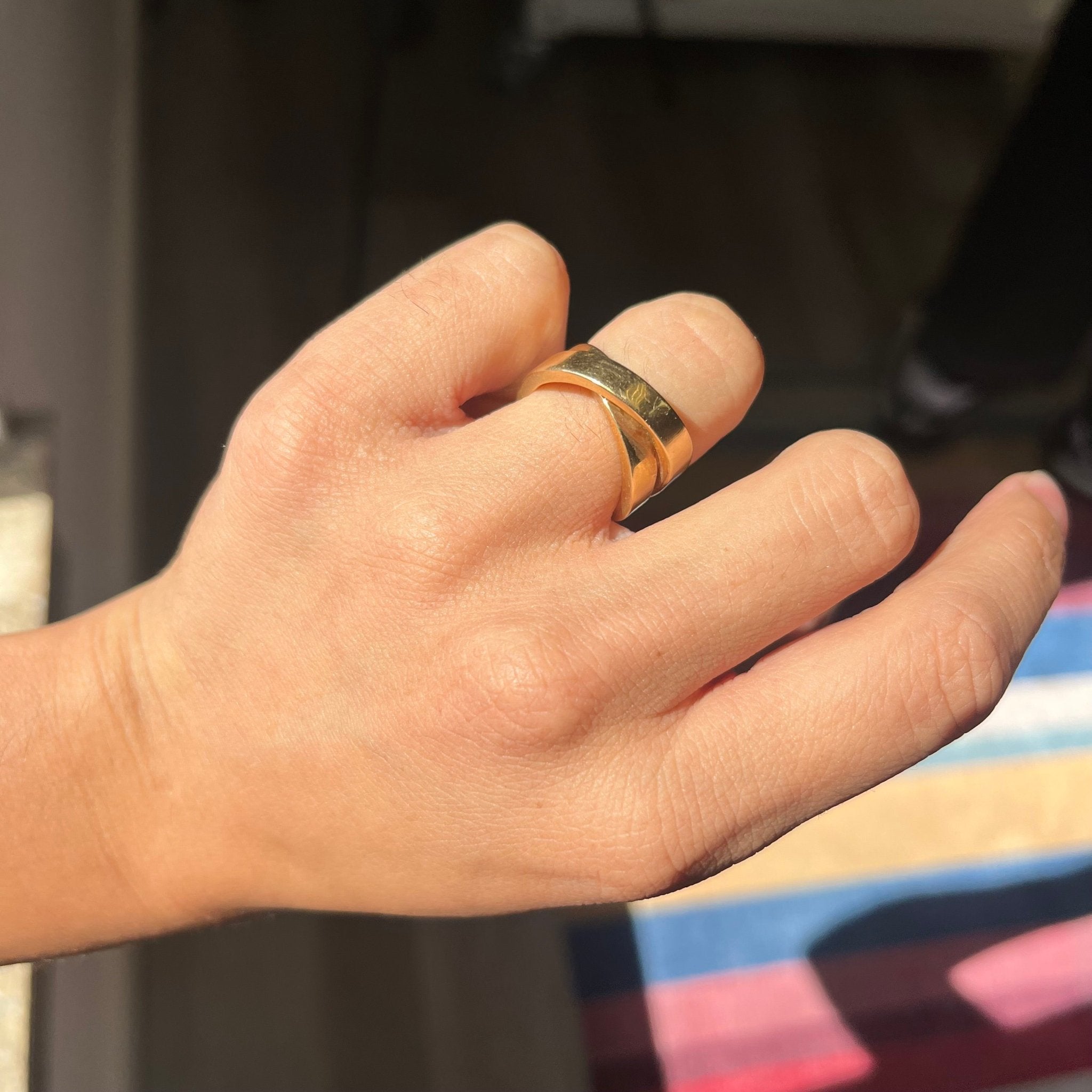 Cartier yellow gold Nouvelle collection band featuring chunky overlapping bands.