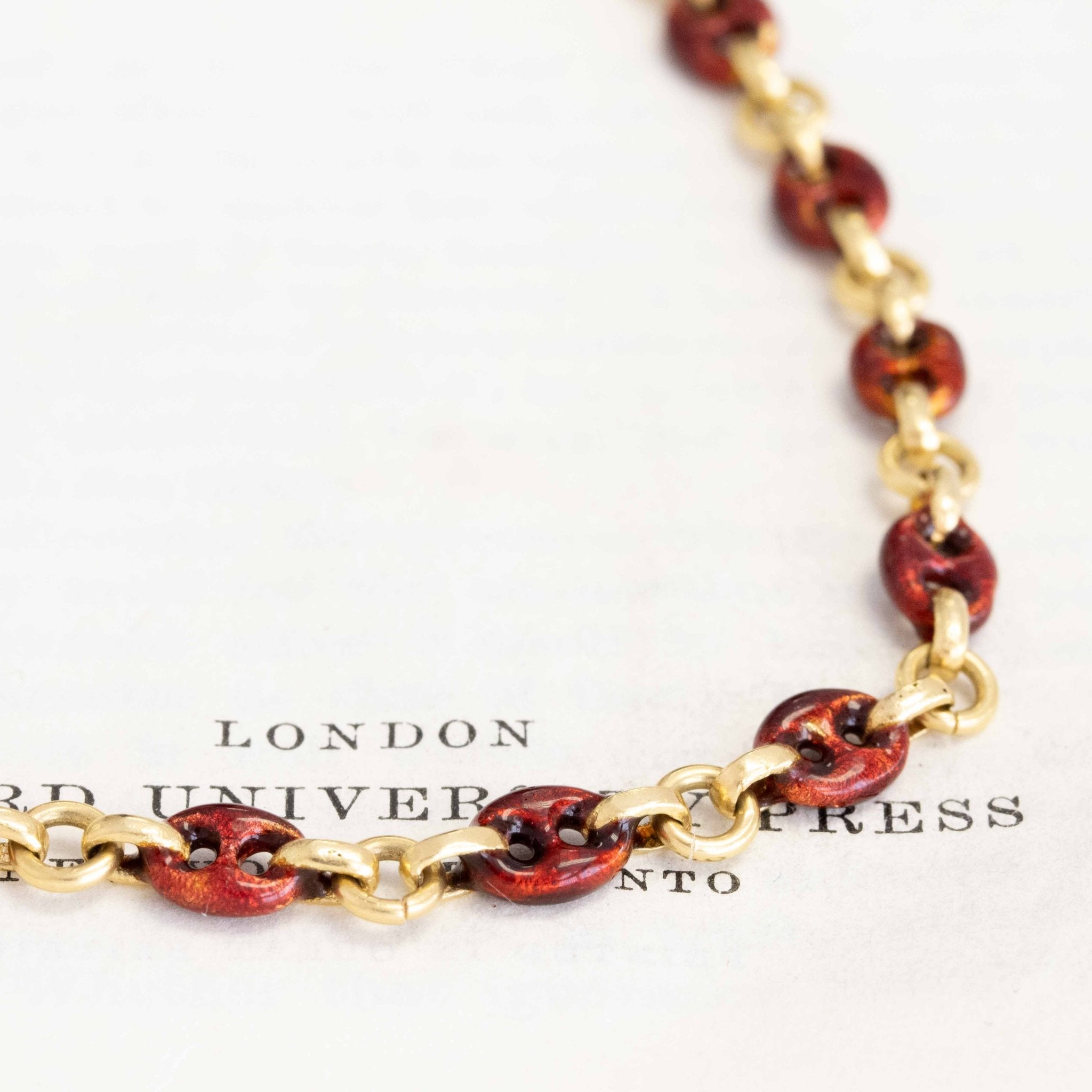 Up close photo o f vintage Red Enamel Mariner Link Chain — 18kt Yellow Gold, 32" Length, 70g