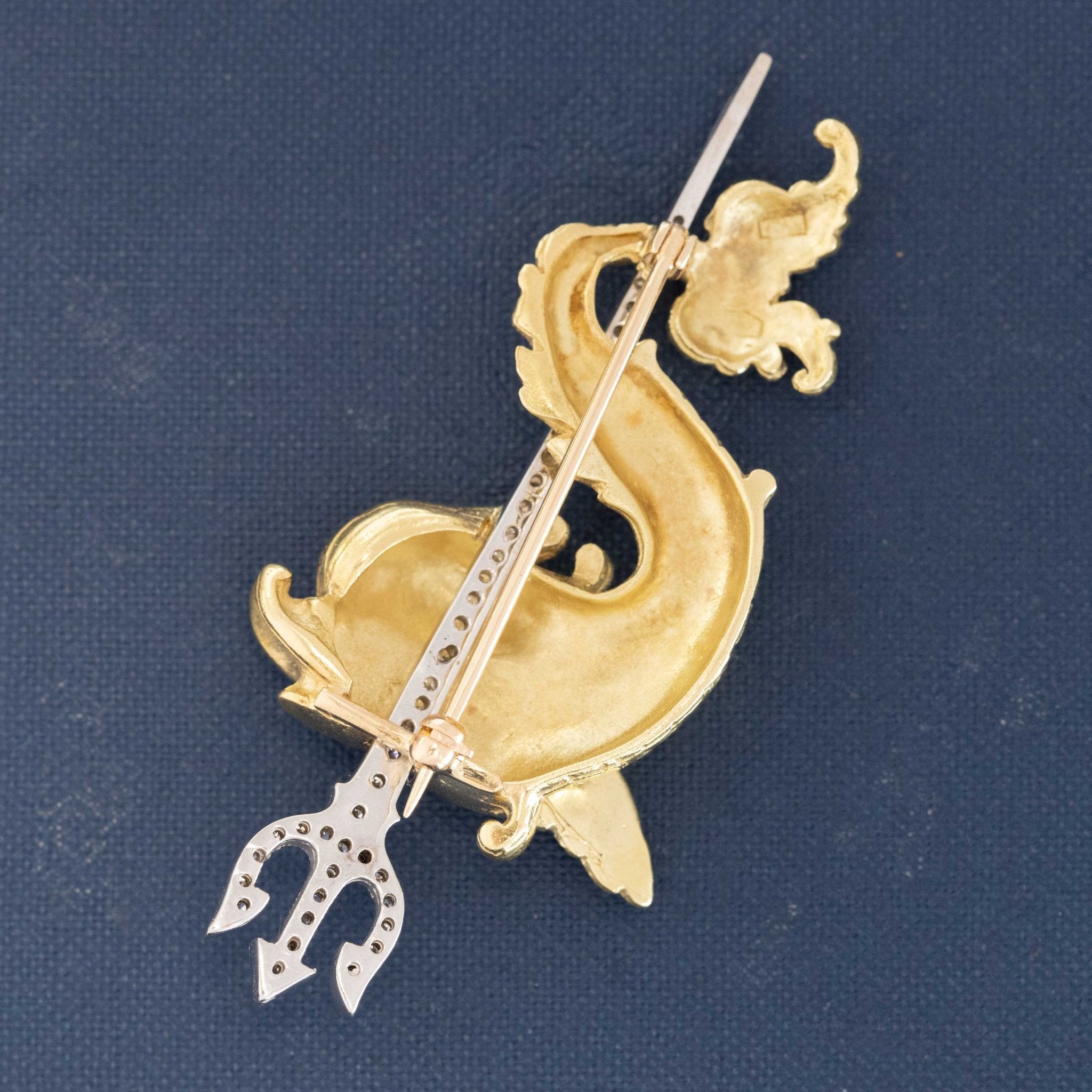Vintage gold sea dragon brooch with diamond trident