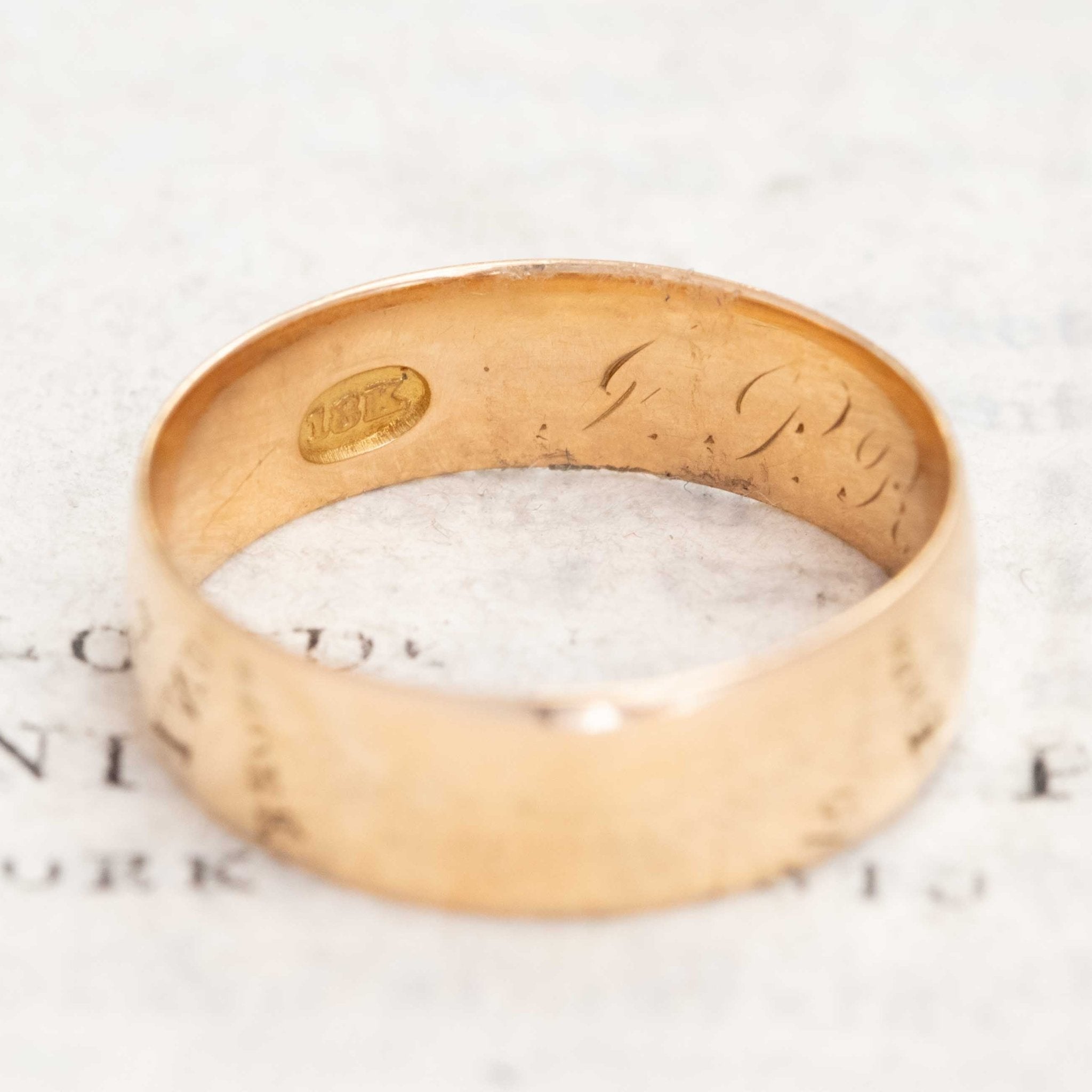 Vintage heirloom-quality 18kt gold wedding band with history.