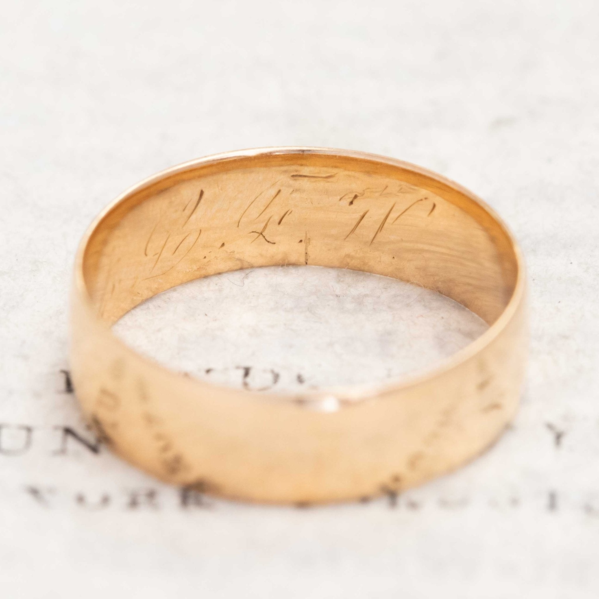 Antique 18kt gold wedding band with subtle handcrafted details.