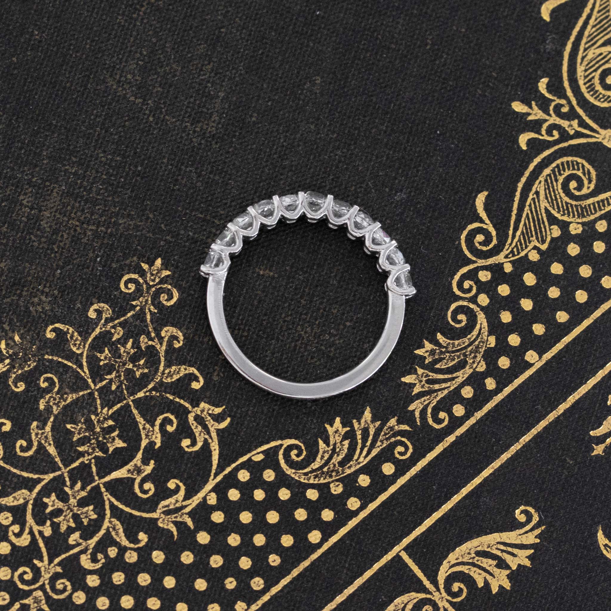 Side view of 1.05ctw Old Mine Cut Diamond Half-Eternity Band, vintage-inspired band with Old Mine Cut Diamonds, crafted in platinum
