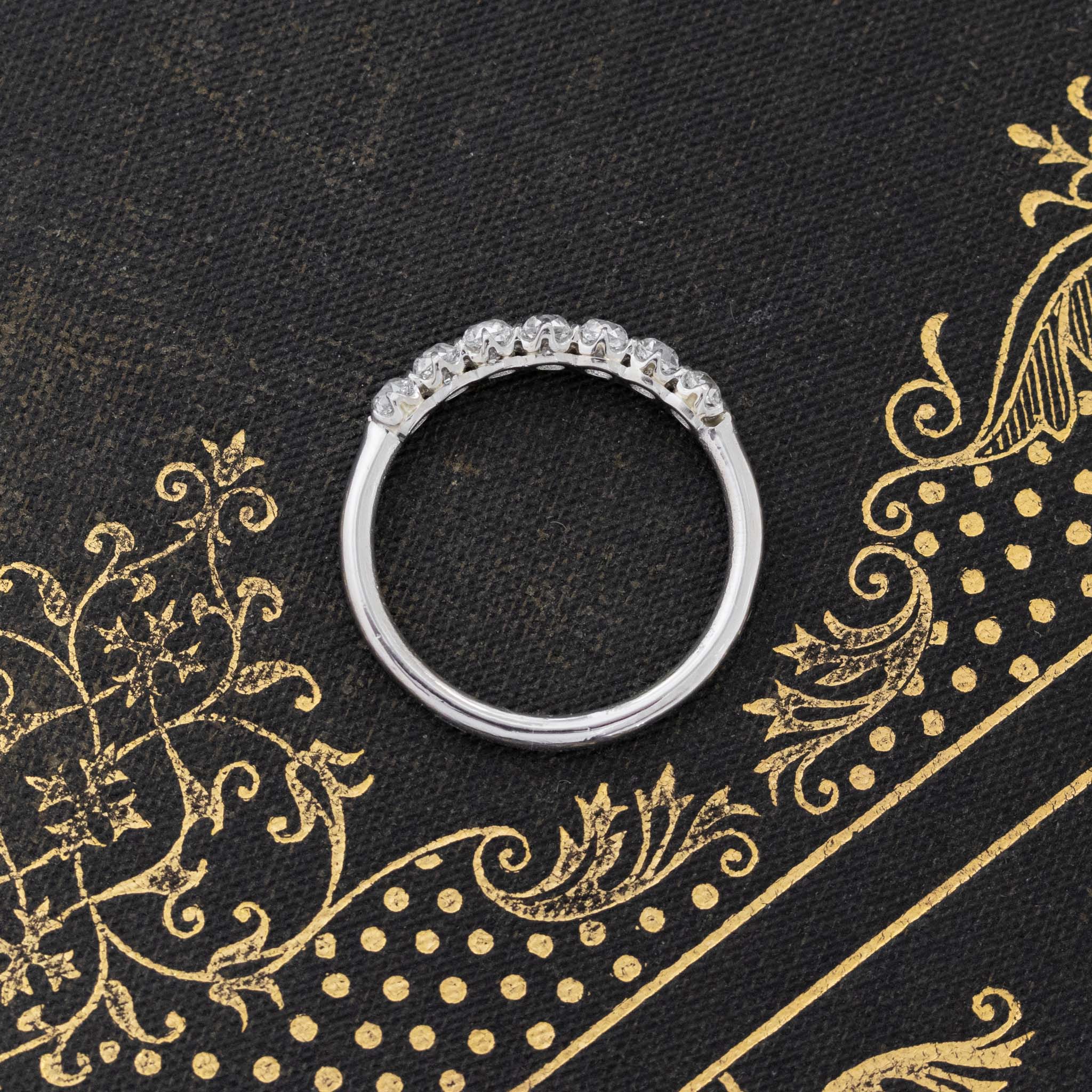 Side view of .68ctw Petite Old Mine Cut Diamond 7-Stone Band, vintage-inspired band with Old Mine Cut Diamonds, crafted in platinum
