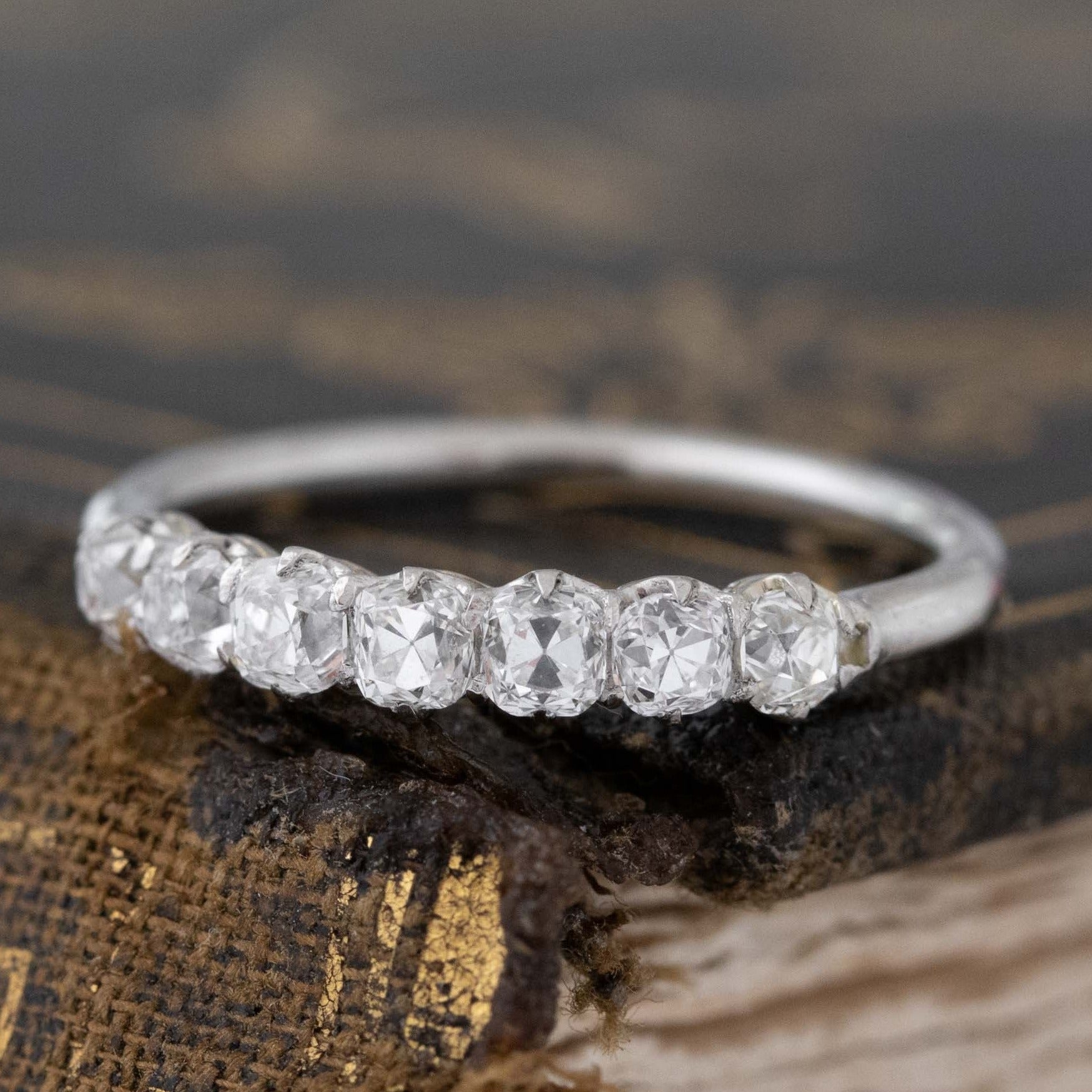 Antique lovers’ .68ctw Petite Old Mine Cut Diamond 7-Stone Band in platinum, featuring rare Earth-mined Old Mine Cut Diamonds