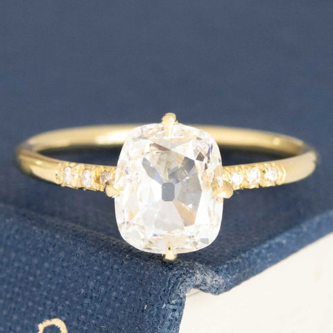 1.52ct GIA F SI1 antique style cushion cut diamond solitaire with diamond shoulders, 18K yellow gold