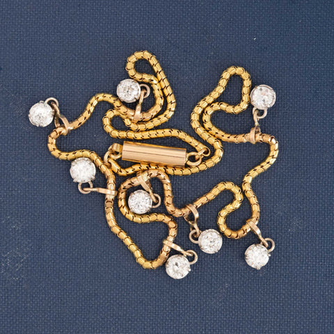 Elegant antique diamond necklace, yellow gold choker with scattered OEC diamonds for timeless sparkle.