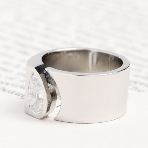 Antique lovers’ 1.01ct Pear Cut Diamond Open Cigar Band, GIA E in platinum, featuring rare Earth-mined Antique Diamonds