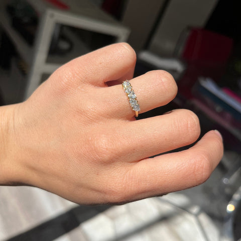 Elegant 1.01ctw Heart Cut Diamond 5-Stone Band, romantic design with Antique Diamonds, Earth-mined diamonds in yellow gold shown on ring finger