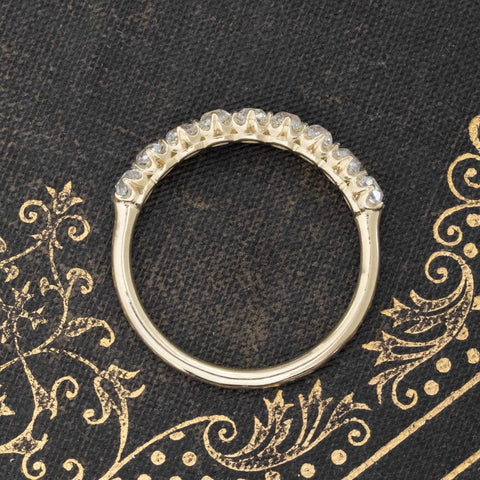Side view of 1.03ctw Old Mine Cut Diamond 9-Stone Half-Hoop Band, vintage-inspired band with Old Mine Cut Diamonds, crafted in yellow gold