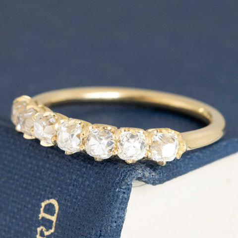 Antique lovers’ 1.03ctw Petite Old Mine Cut Diamond 7-Stone Half-Hoop Band in yellow gold, featuring rare Earth-mined Old Mine Cut Diamonds
