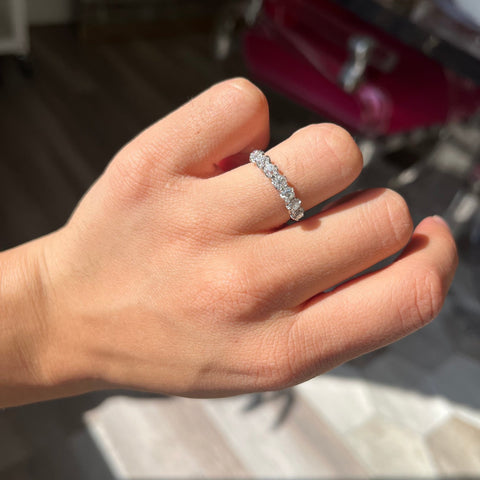 Elegant 1.04ctw Old Mine Cut Diamond 7-Stone Band, romantic design with Old Mine Cut Diamonds, Earth-mined diamonds in platinum shown on ring finger