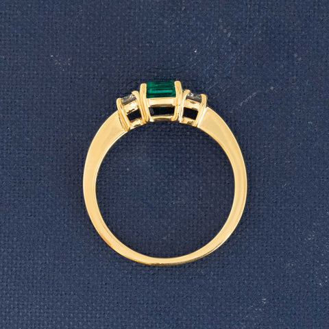 1.05ctw Step Cut Emerald & Diamond Trilogy Ring