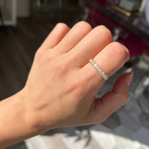 Elegant 1.06ctw Old Mine Cut Diamond Half-Hoop Band, romantic design with Old Mine Cut Diamonds, Earth-mined diamonds in yellow gold shown on ring finger