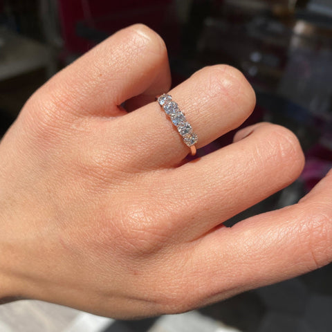 Elegant 1.08ctw Old Mine Cut Diamond 5-Stone Band, romantic design with Old Mine Cut Diamonds, Earth-mined diamonds in rose gold shown on ring finger