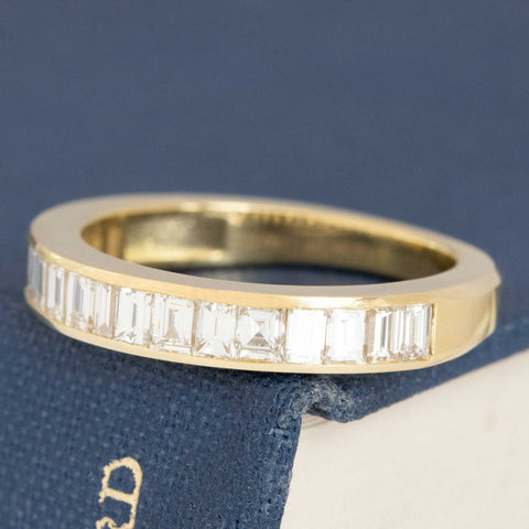 Antique lovers’ 1.10ctw Baguette Cut Diamond Channel Set Band in yellow gold, featuring rare Earth-mined Baguette Cut Diamonds