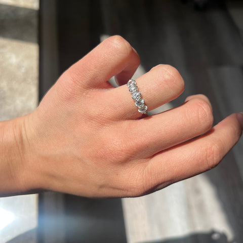 Elegant 1.11ctw Old European Cut Diamond 5-Stone Band, romantic design with Old European Cut Diamonds, Earth-mined diamonds in platinum shown on ring finger