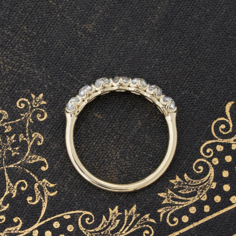 Side view of 1.11ctw Old Mine Cut Diamond 7-Stone Band, vintage-inspired band with Old Mine Cut Diamonds, crafted in yellow gold