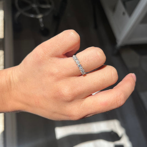 Elegant 1.11ctw Old Mine Cut Diamond 7-Stone Band, romantic design with Old Mine Cut Diamonds, Earth-mined diamonds in platinum shown on ring finger