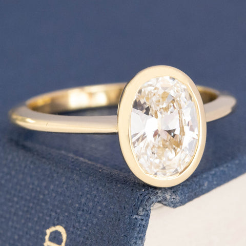 1.15ct Oval Cut Diamond Bezel Solitaire