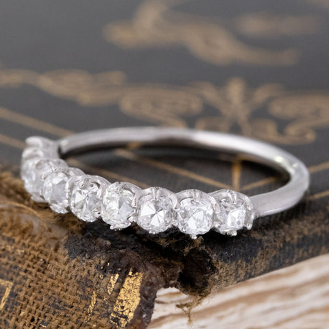 Antique lovers’ 1.15ctw Old Mine Cut Diamond 9-Stone Half-Hoop Band in platinum, featuring rare Earth-mined Old Mine Cut Diamonds