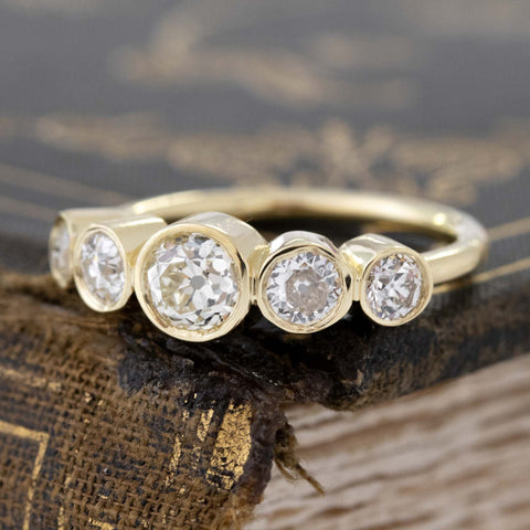 Antique lovers’ 1.16ctw Old European Cut Diamond Graduated 5-Stone Band in yellow gold, featuring rare Earth-mined Old European Cut Diamonds
