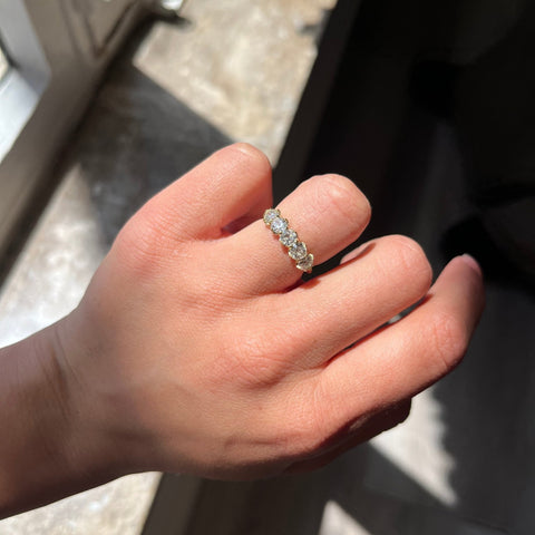 Elegant 1.19ctw Old European Cut Diamond 5-Stone Band, romantic design with Old Mine Cut Diamonds, Earth-mined diamonds in yellow gold shown on ring finger