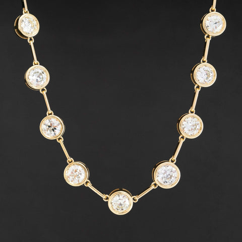 Old European cut diamond bezel riviere necklace in 18k yellow gold, 12.15 carats total weight