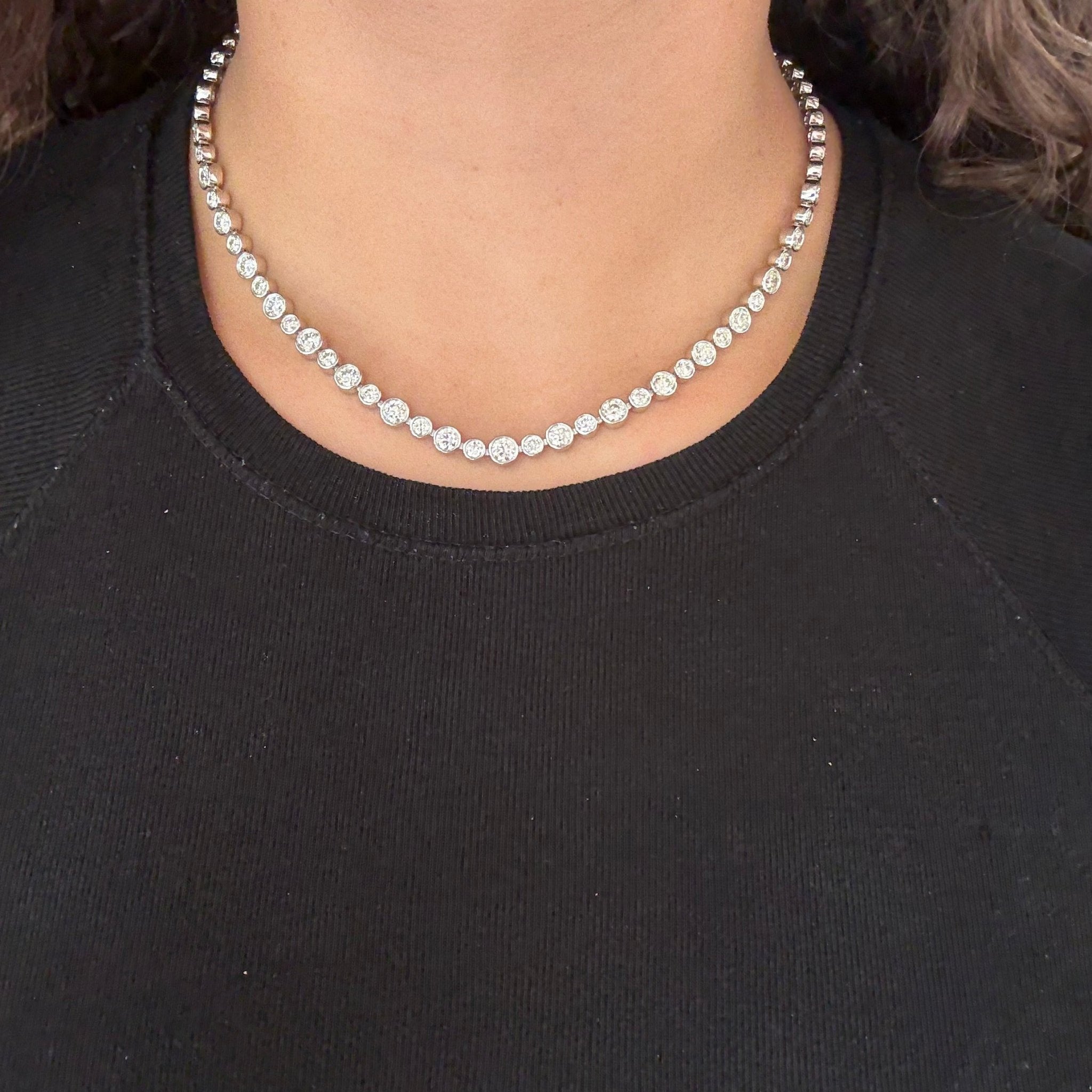 13.36ctw Old European Cut diamond bezel tennis necklace on neckline