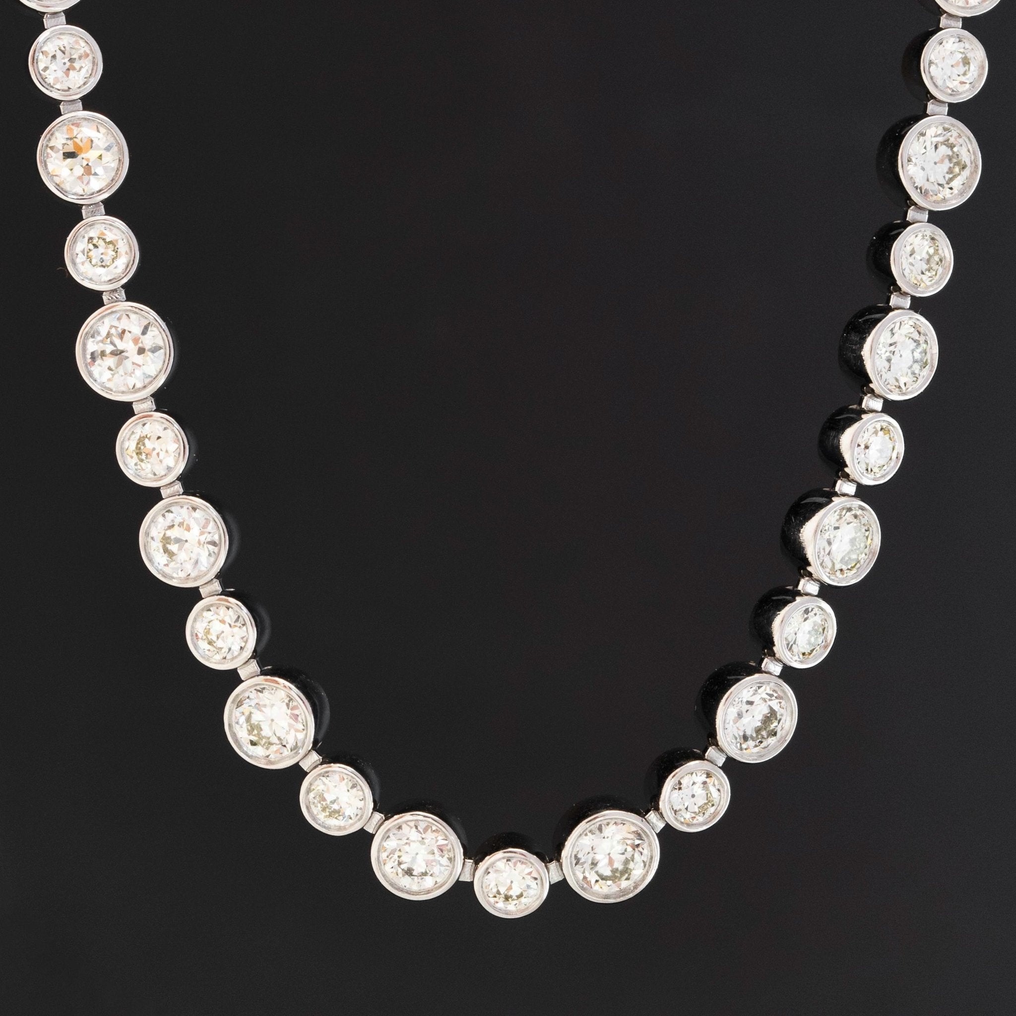 Close-up of bezel set Old European Cut diamonds in tennis style necklace