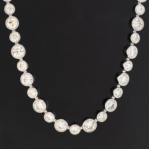 Close-up of bezel set Old European Cut diamonds in tennis style necklace