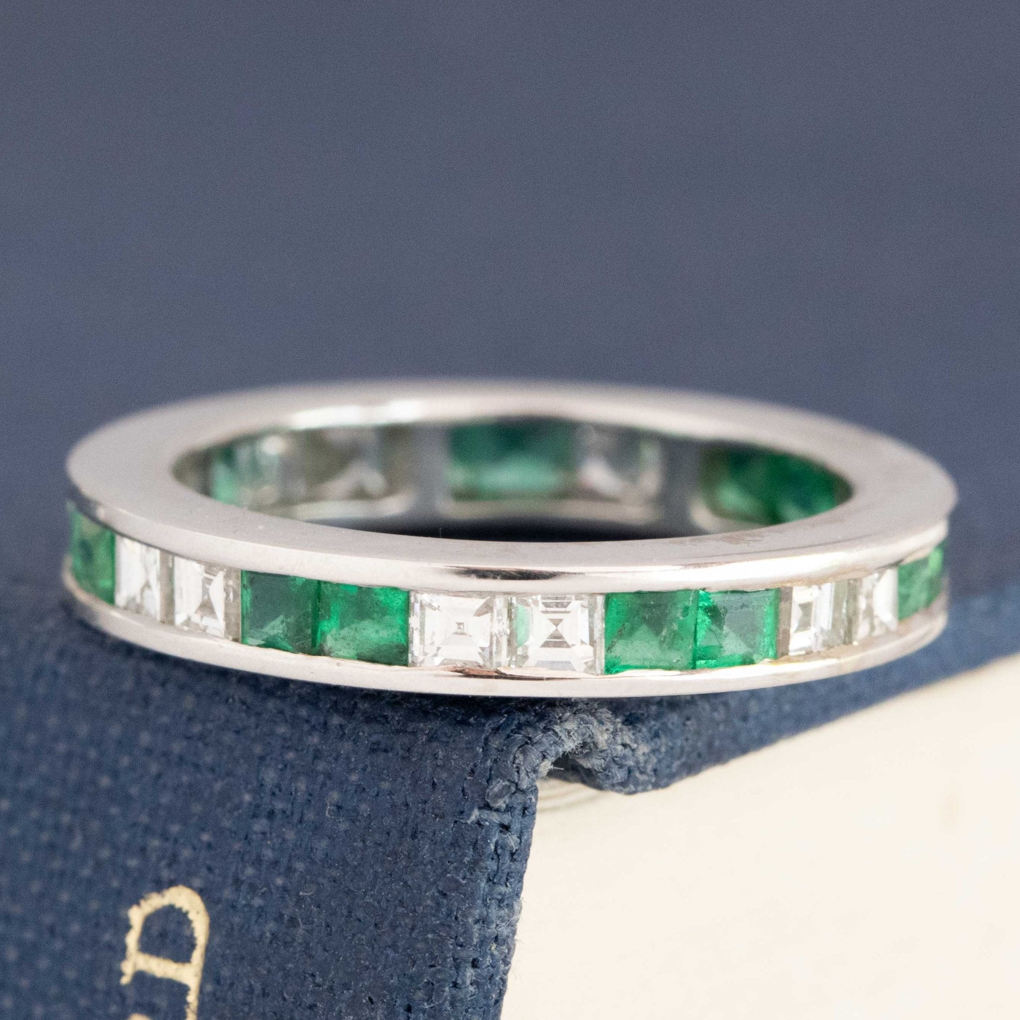 1.66ctw Emerald & Step Cut Diamond Eternity Band