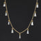 1.66ctw Tapered Baguette Cut Diamond Station Necklace