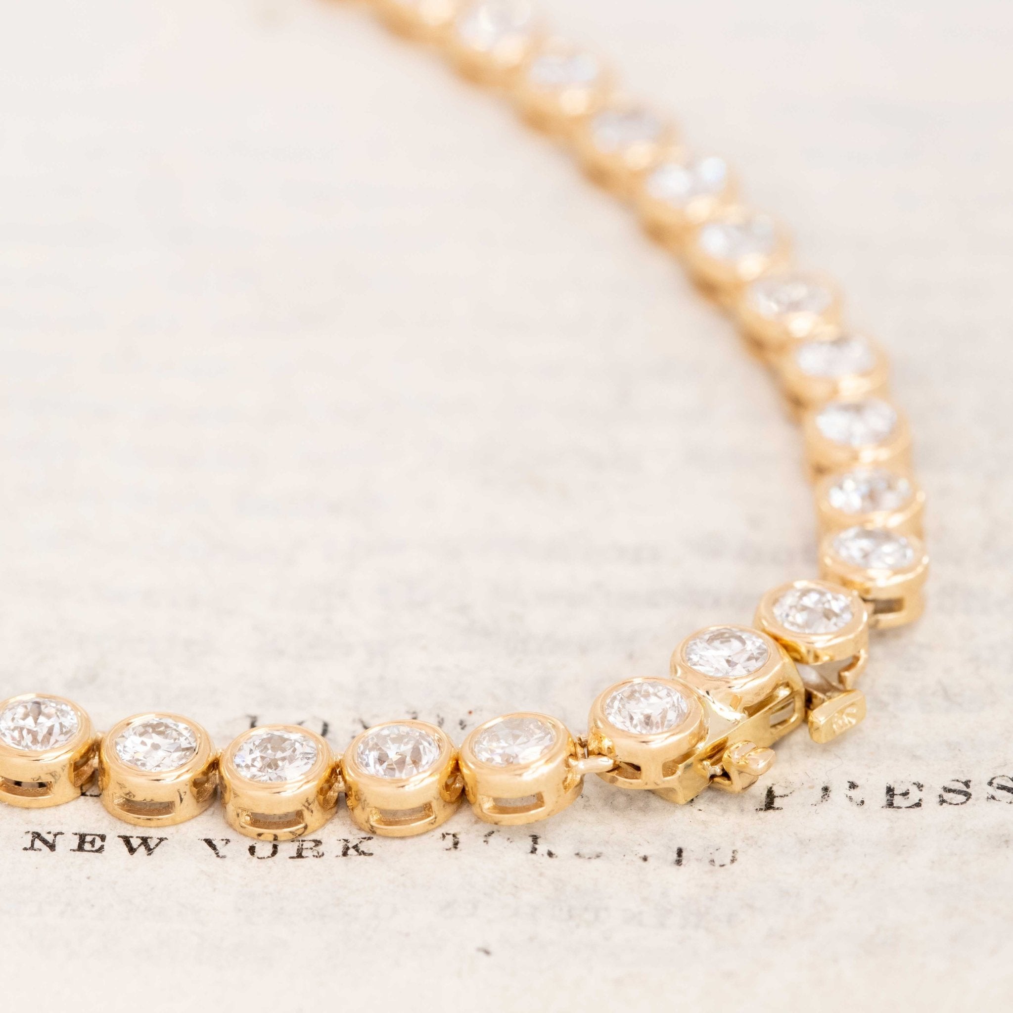 Close-up of recycled Old European cut diamonds in bezel settings