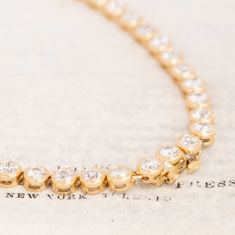 Close-up of recycled Old European cut diamonds in bezel settings