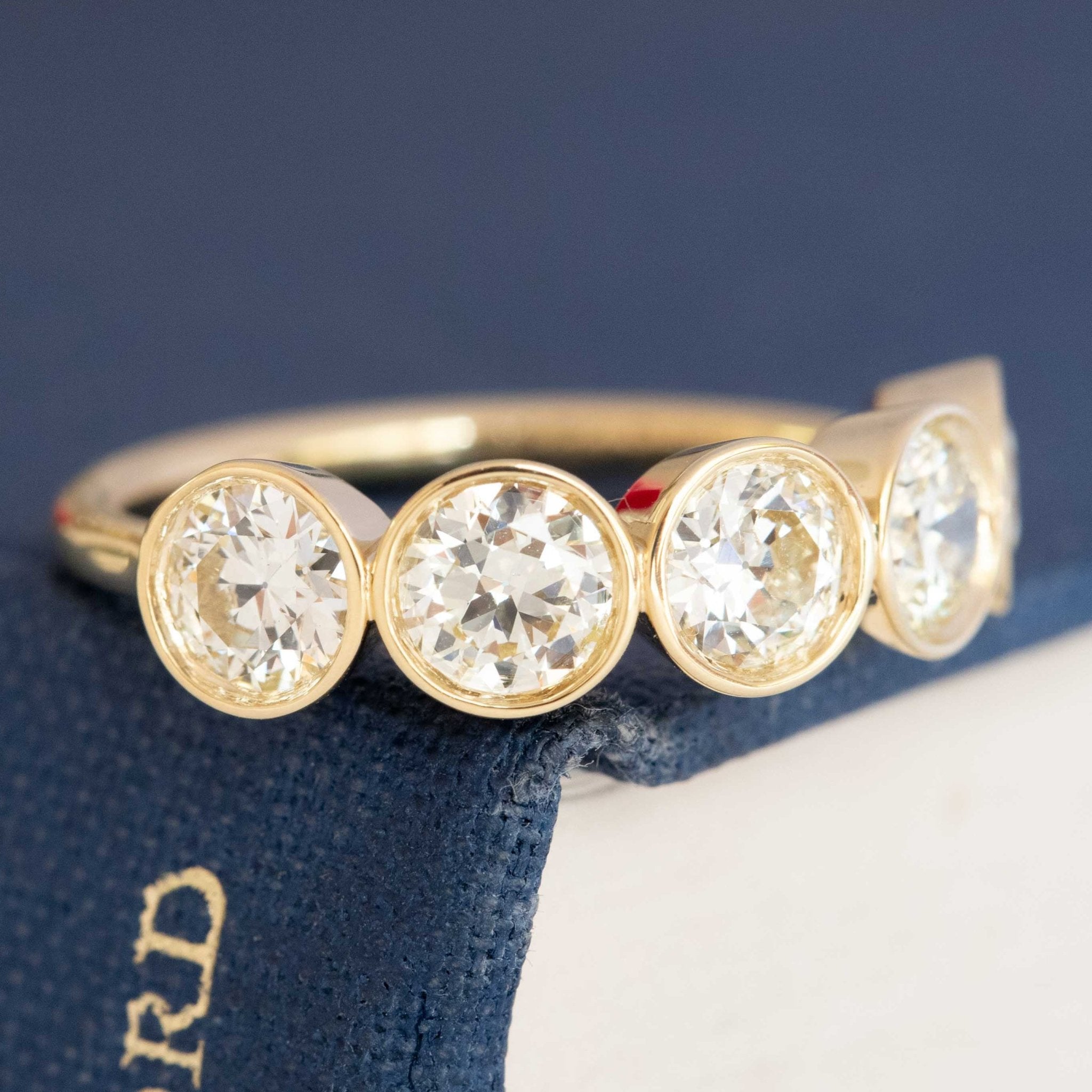 Jewels by Grace vintage diamond five-stone bezel band